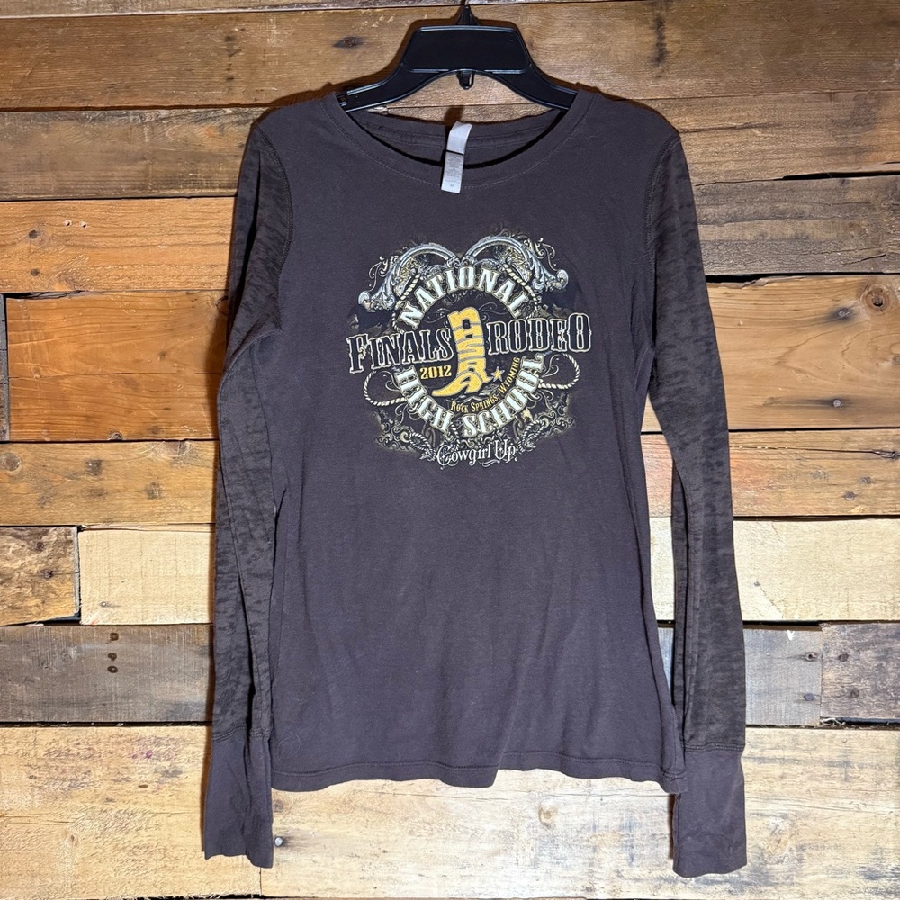 Long-sleeve T with graphic for 2012 National High School Finals Rodeo in Hawaii.